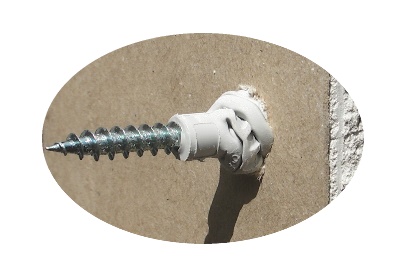 Plasterboard fixing wall plug demonstrating twisting grab action.